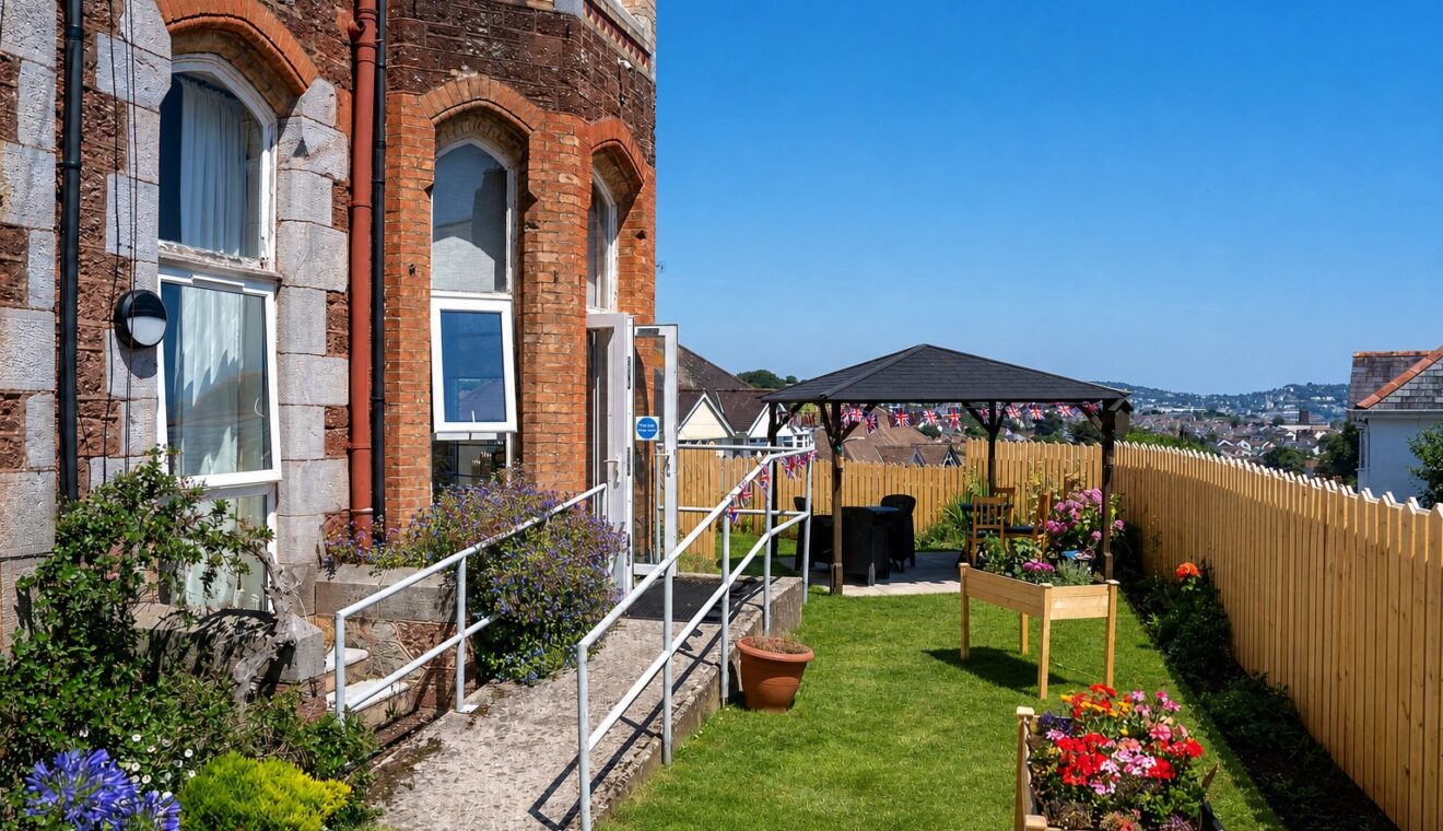 Kingsmount Residential Home's building exterior with accessible ramped entrance