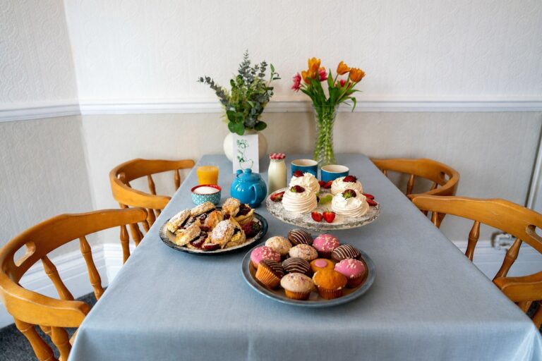 A full afternoon tea spread of cakes and pastries at Kingsmount